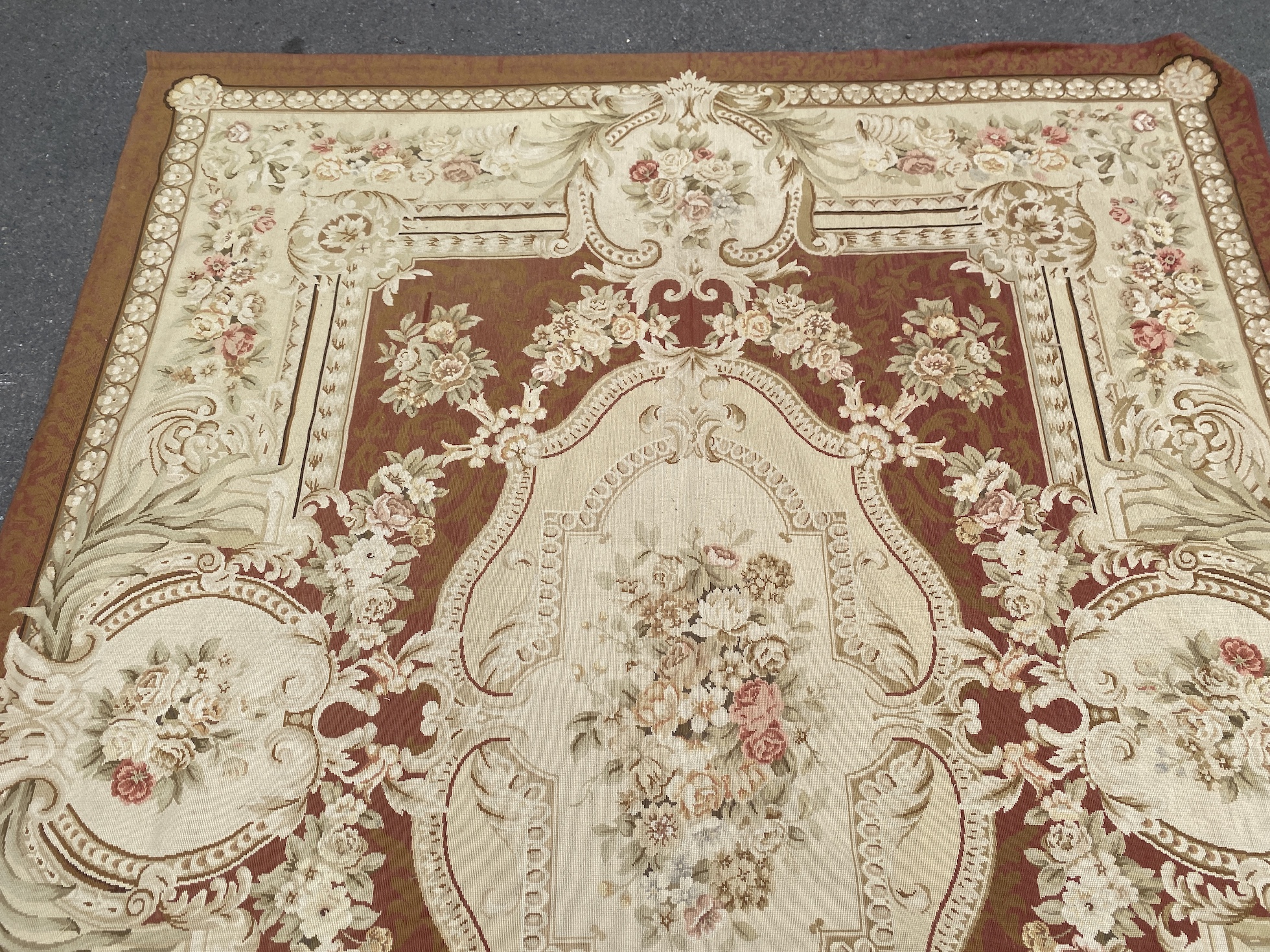 An Aubusson style tapestry carpet, approximately 300 x 240cm
